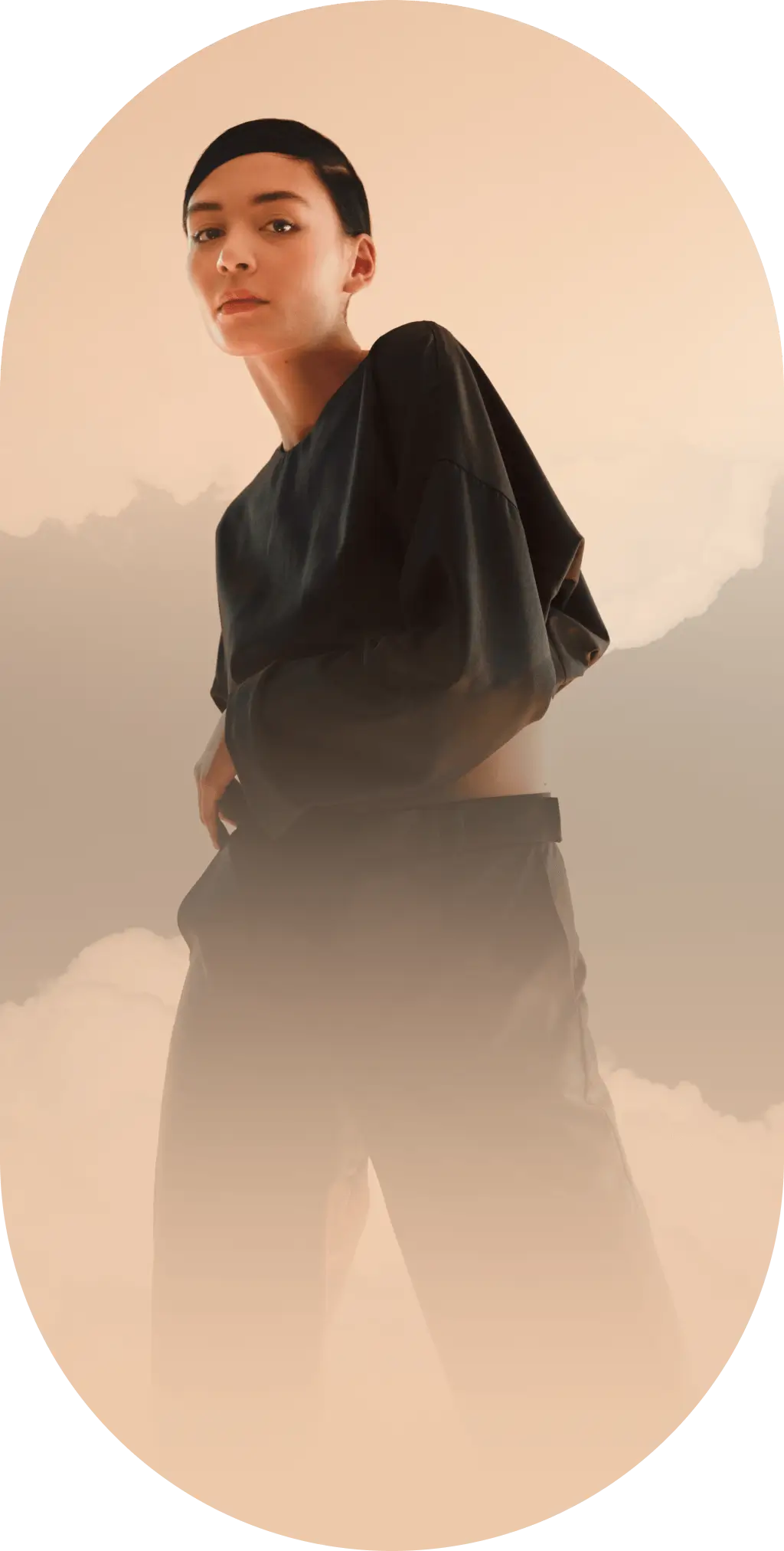 person stanging amongst clouds on beige background